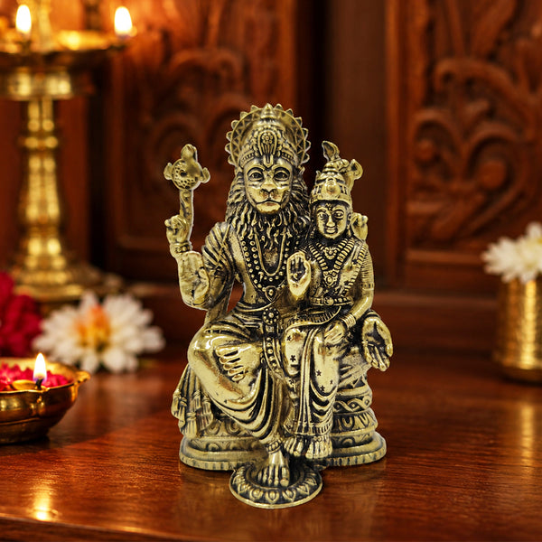 Brass Lakshmi Narasimha Idol Placed in Home Pooja Room for Divine Blessings and Spiritual Worship
