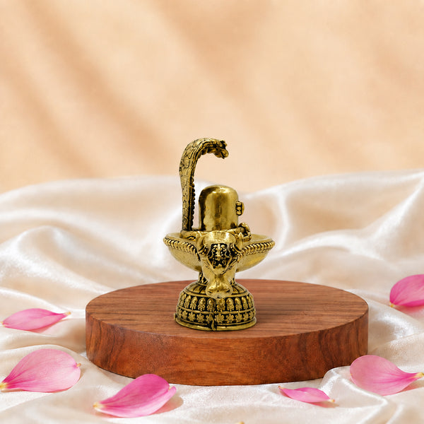 Side view of solid brass Shiva Lingam with Nandi and Nagabharanam