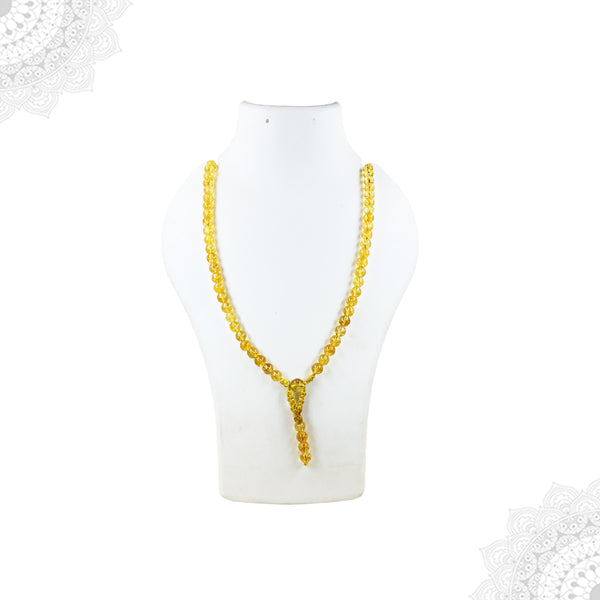 A Citrine crystal mala necklace featuring translucent honey-yellow beads displayed on a white jewelry mannequin.