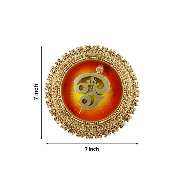 Decorative wall hanging with Om symbol on a white background