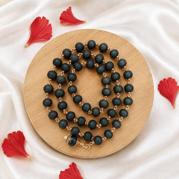 Karungali Mala Necklace with Copper Finish Pendant Displayed on Jewelry Bust for Spiritual and Traditional Wear