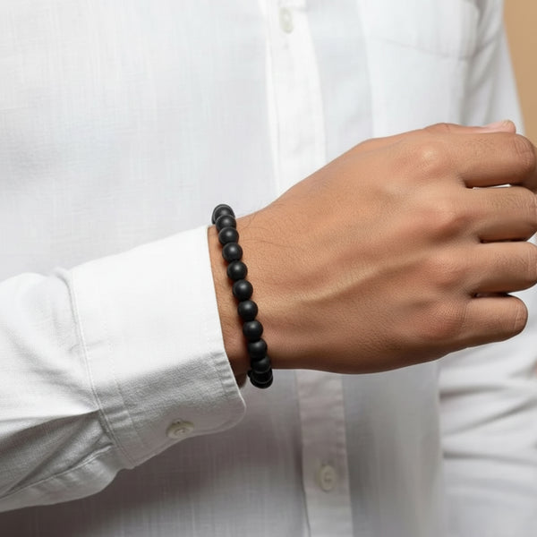 Man wearing original 8mm Karungali bracelet