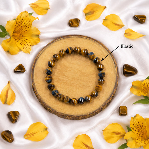 Detailed view of the high-durability elastic stretch cord on a genuine Tiger's Eye manifestation bracelet.