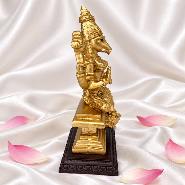 Left side view of Varahi Amman statue showing the boar face and crown with crescent moon