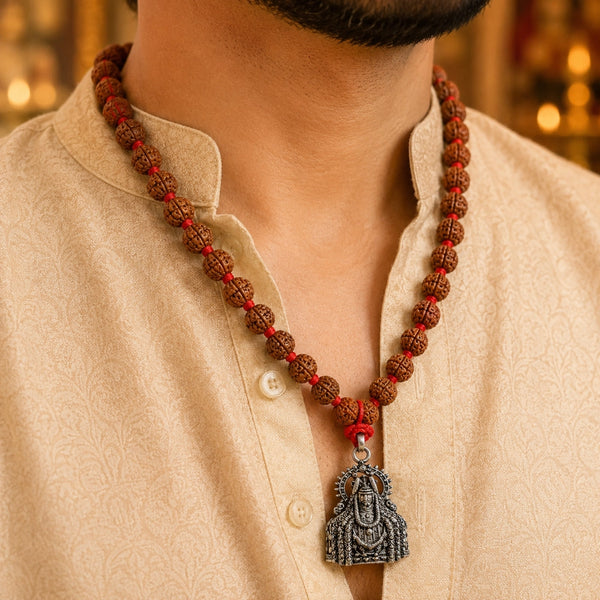 A person wearing the sacred 5 Face Rudraksha Mala with Annamalaiyar white metal pendant for spiritual grace and protection.