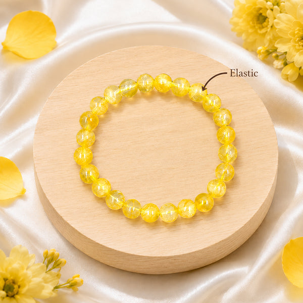Detailed view of the high-durability elastic stretch cord on a genuine yellow citrine prosperity bracelet.